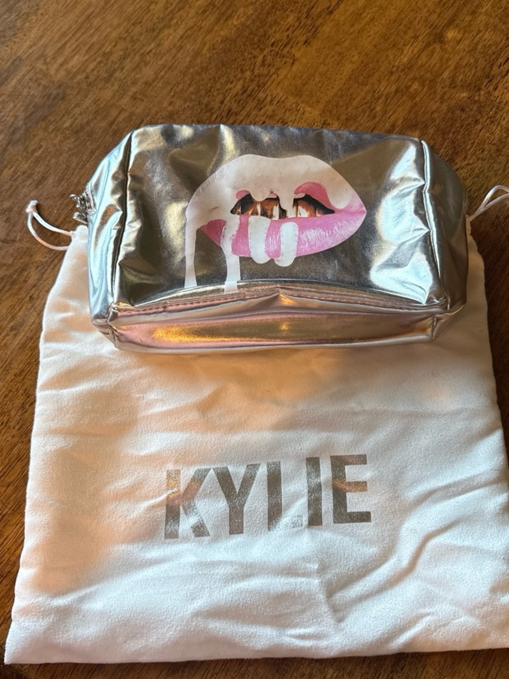 Kylie Cosmetics Metallic Silver Lip Logo Cosmetic Bag with Pink Accent
